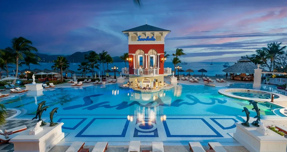 Sandals_Grande_St_Lucian_main_pool_bar_night_c3a5f34883.webp